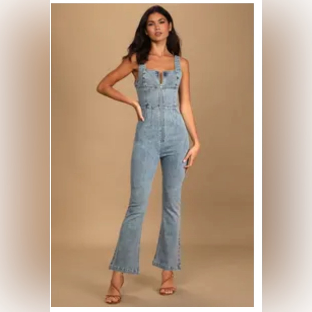 Zip front denim jumpsuit.